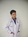 TheÃ¢â¬â¹ YoungÃ¢â¬â¹ medicalÃ¢â¬â¹ doctorÃ¢â¬â¹ standingÃ¢â¬â¹ in front of the clinicÃ¢â¬â¹ HealthcareÃ¢â¬â¹ University Hospital